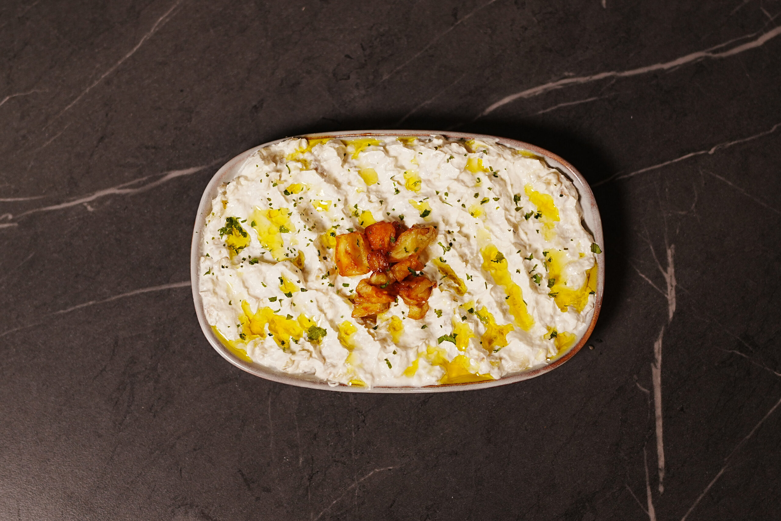 Berenjena en salsa de yogurt